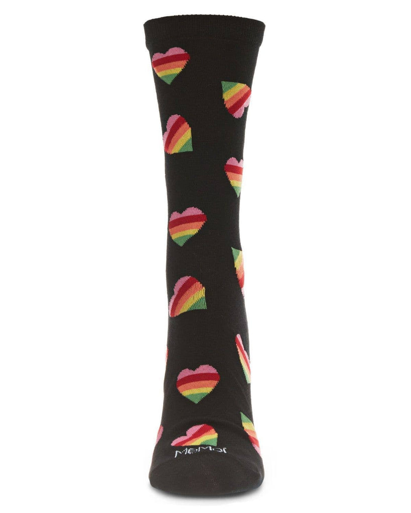 A single "Rainbow Pride Heart Bamboo Crew in Black" sock is vertically oriented against a white background. The sock features colorful rainbow heart patterns and the brand name "MeMoi" can be seen on the toe area, celebrating LGBTQ pride with its vibrant design.